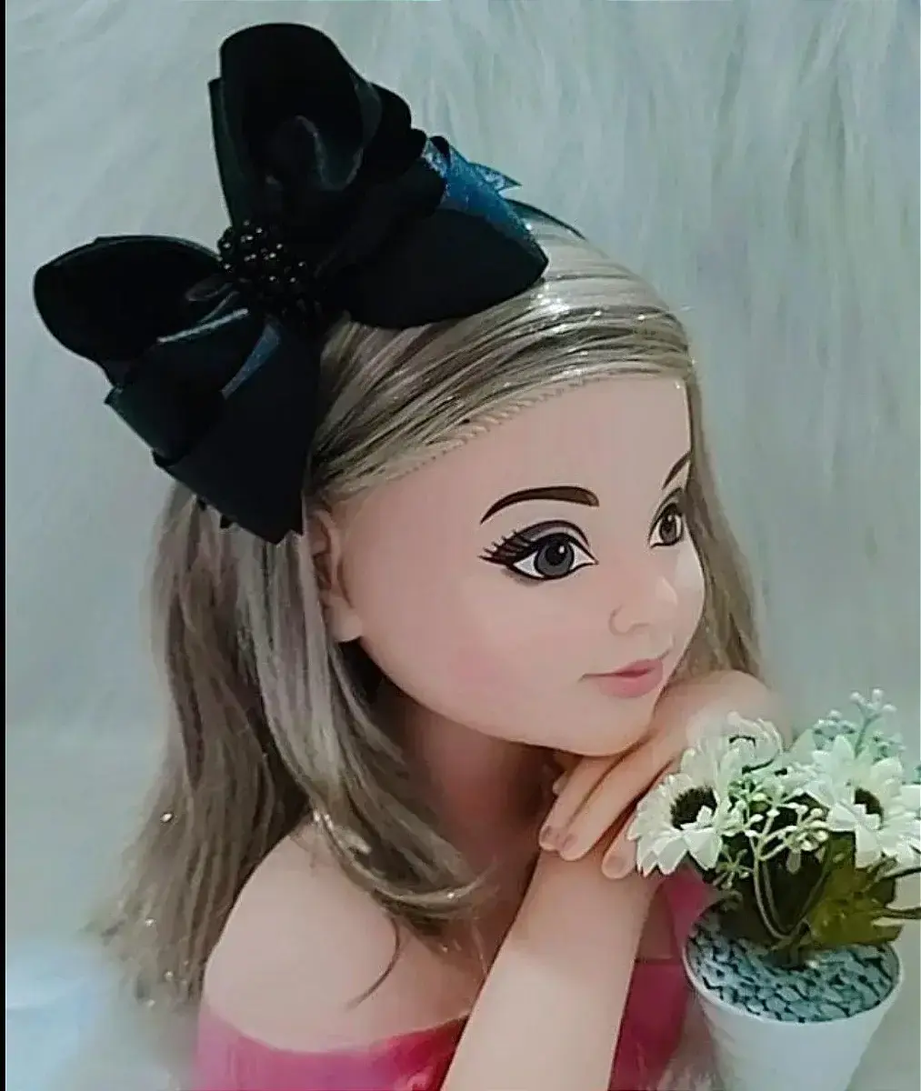 Tiara preta laço miolo perolas
